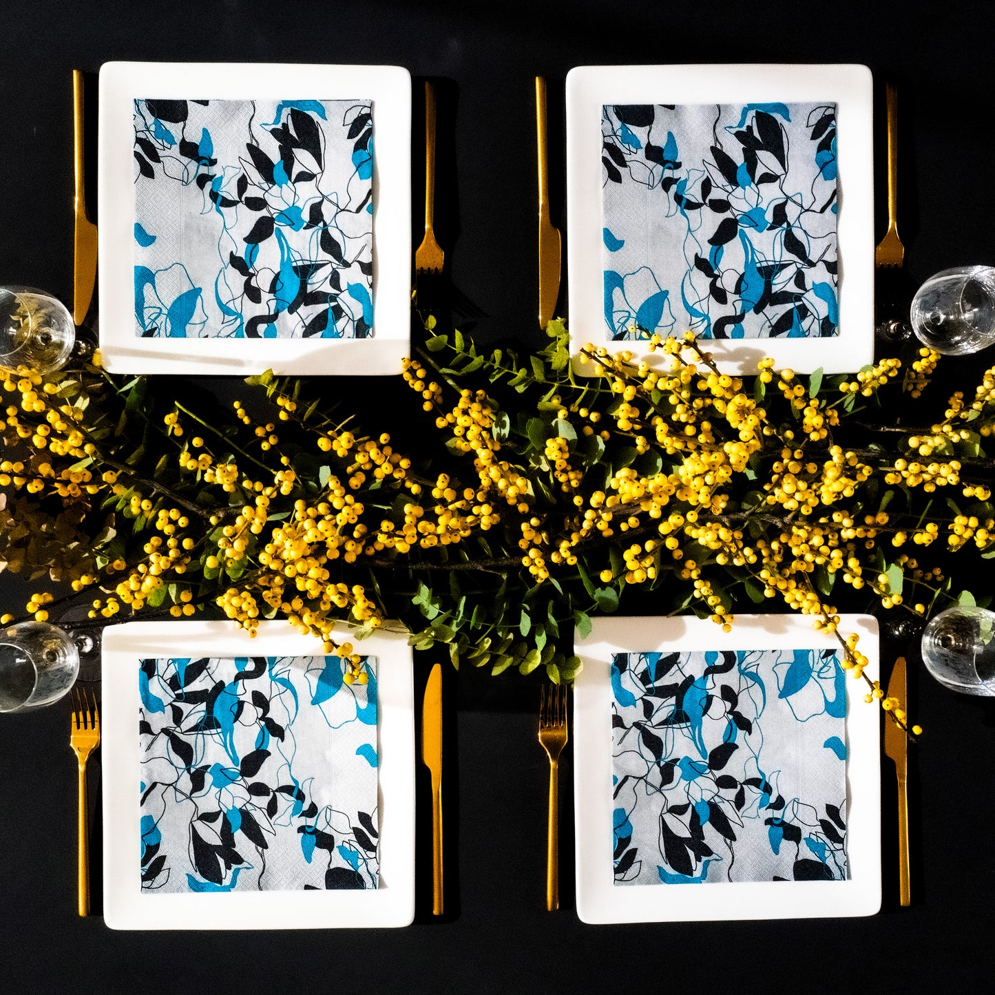 Teal, black and gray dinner napkin with floral/leaf pattern