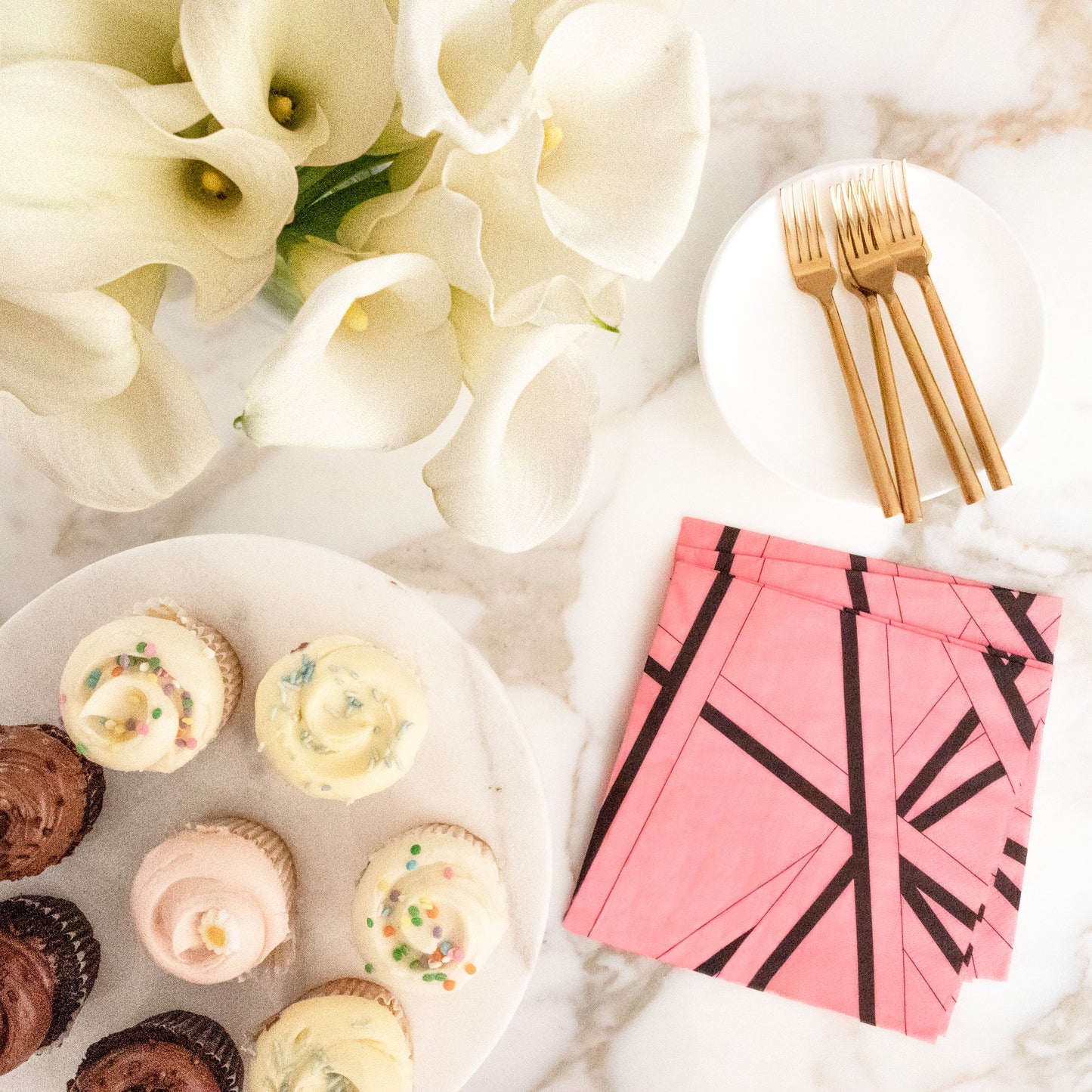 Pink dinner napkin with black striped pattern
