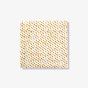 White cocktail napkin with gold abstract pattern