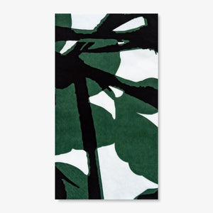 White guest towel napkin with green and black design