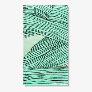 Green, black and off-white guest towel napkin with abstract pattern