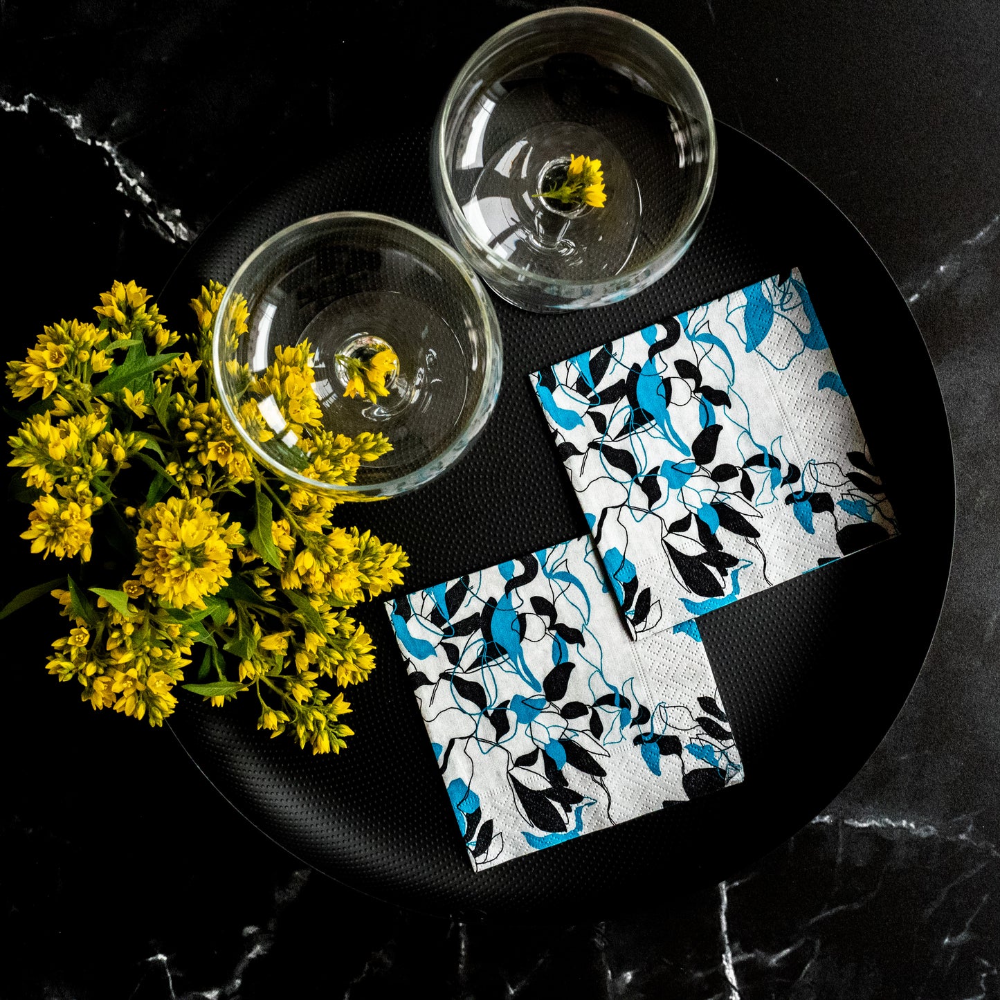 Teal, black and gray cocktail napkin with floral/leaf pattern