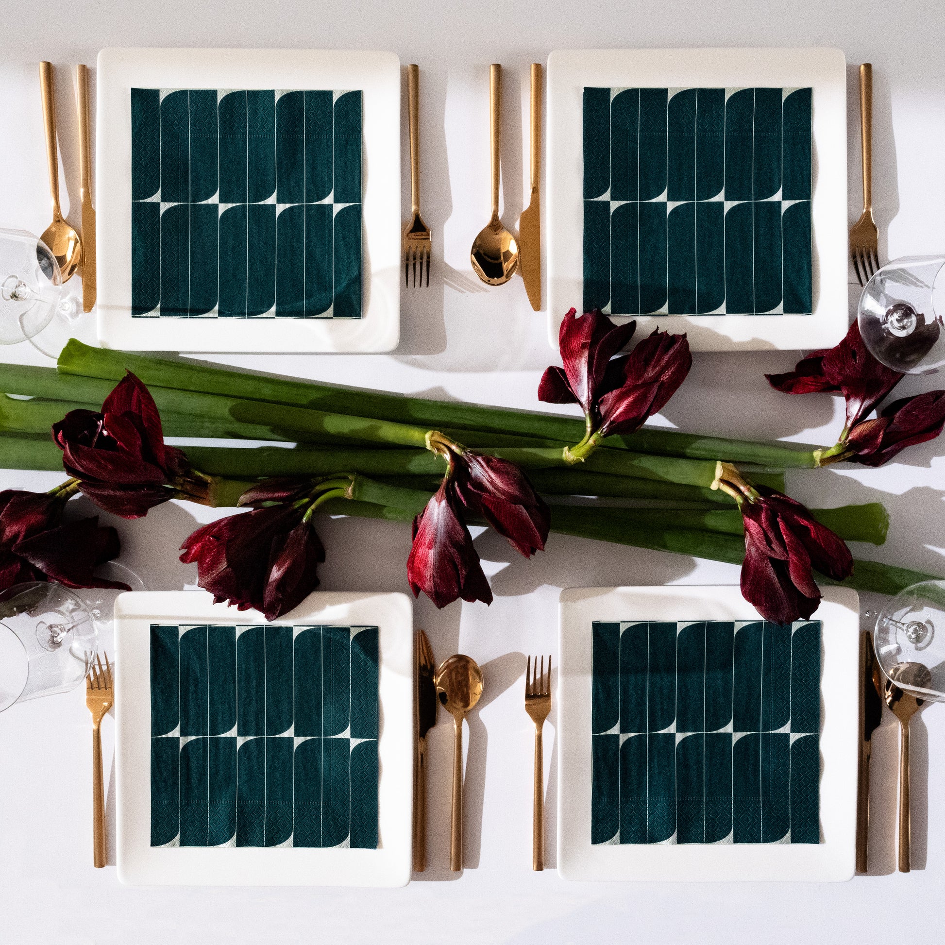 Teal and white dinner napkin with abstract design