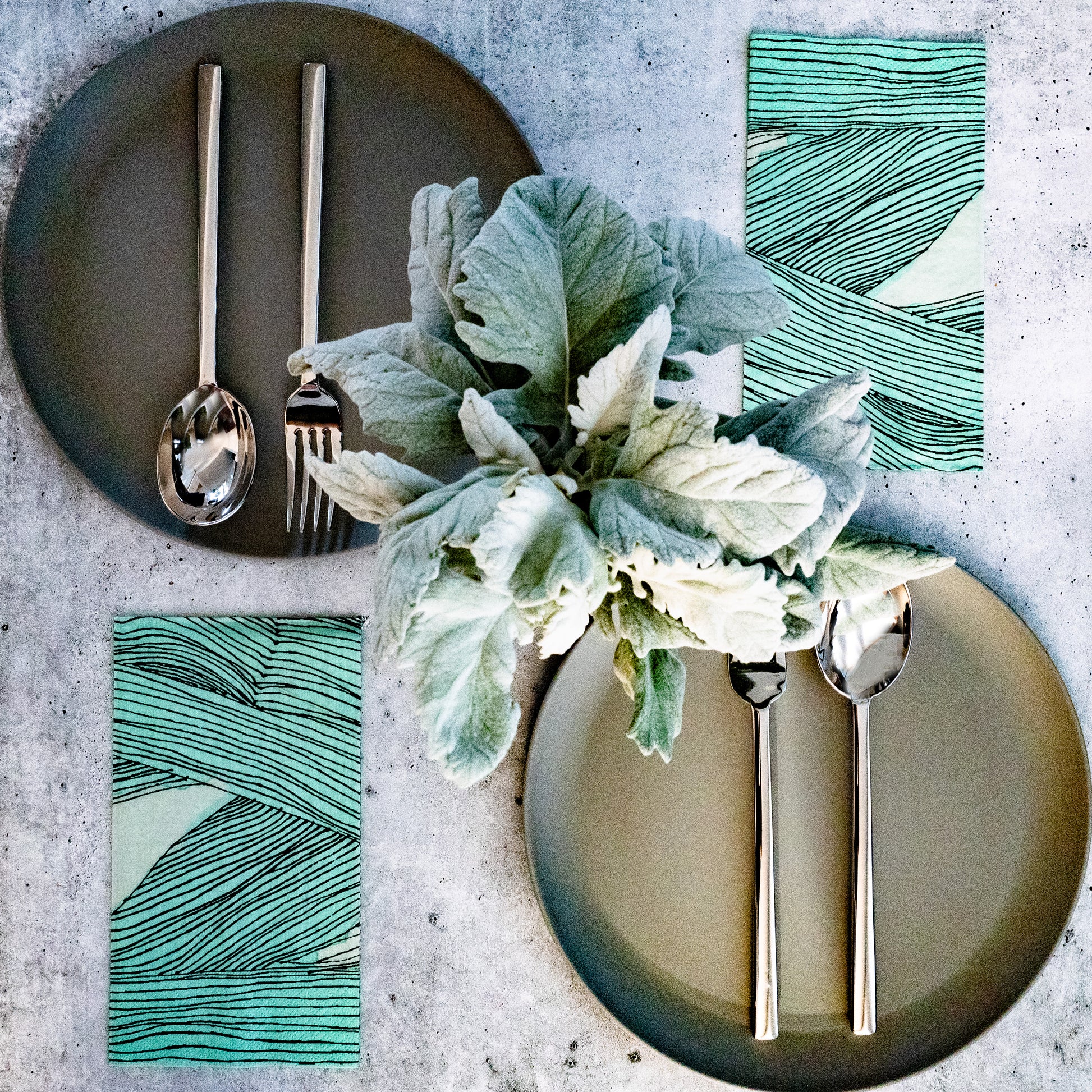 Green, black and off-white guest towel napkin with abstract pattern