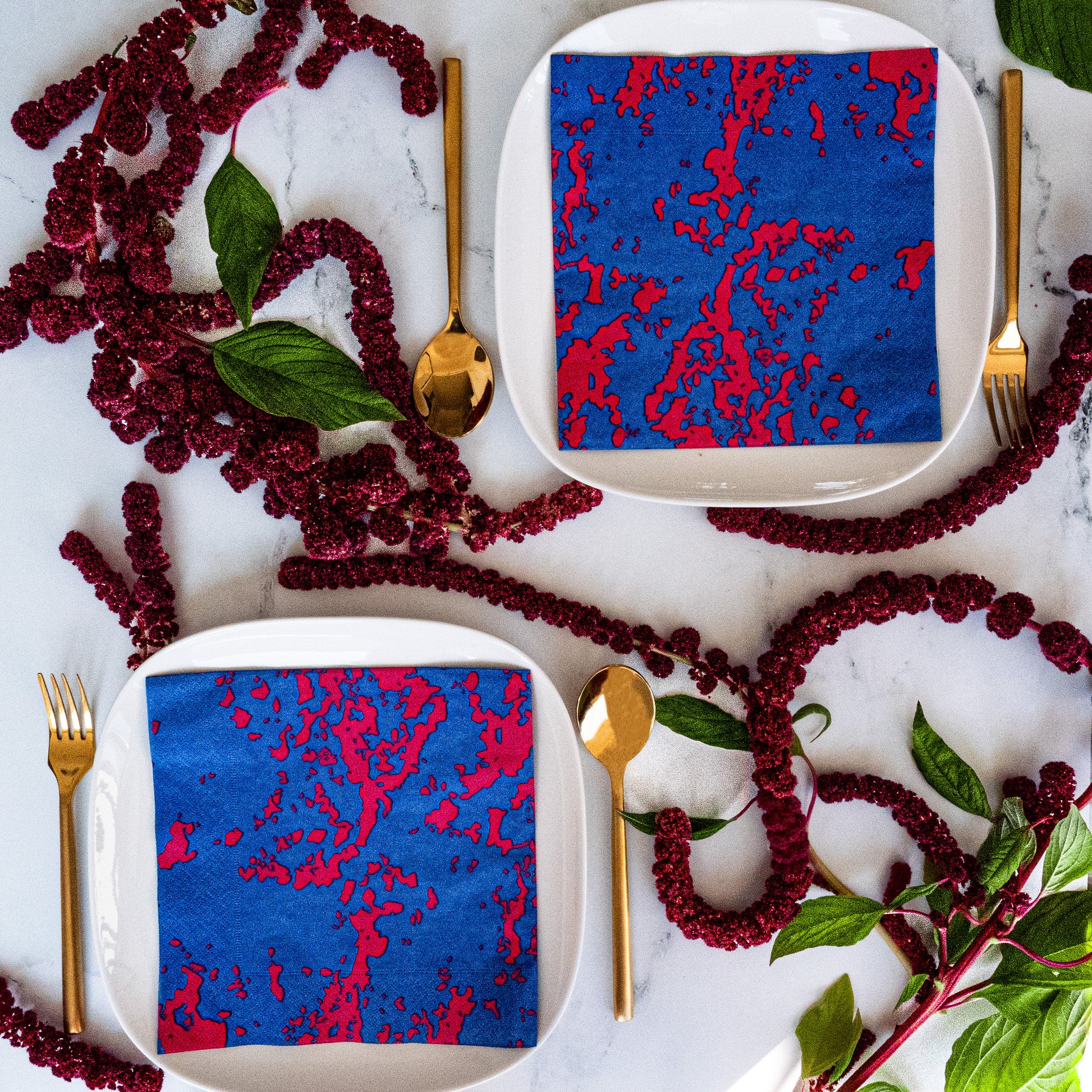 Blue and pink dinner napkin with abstract pattern