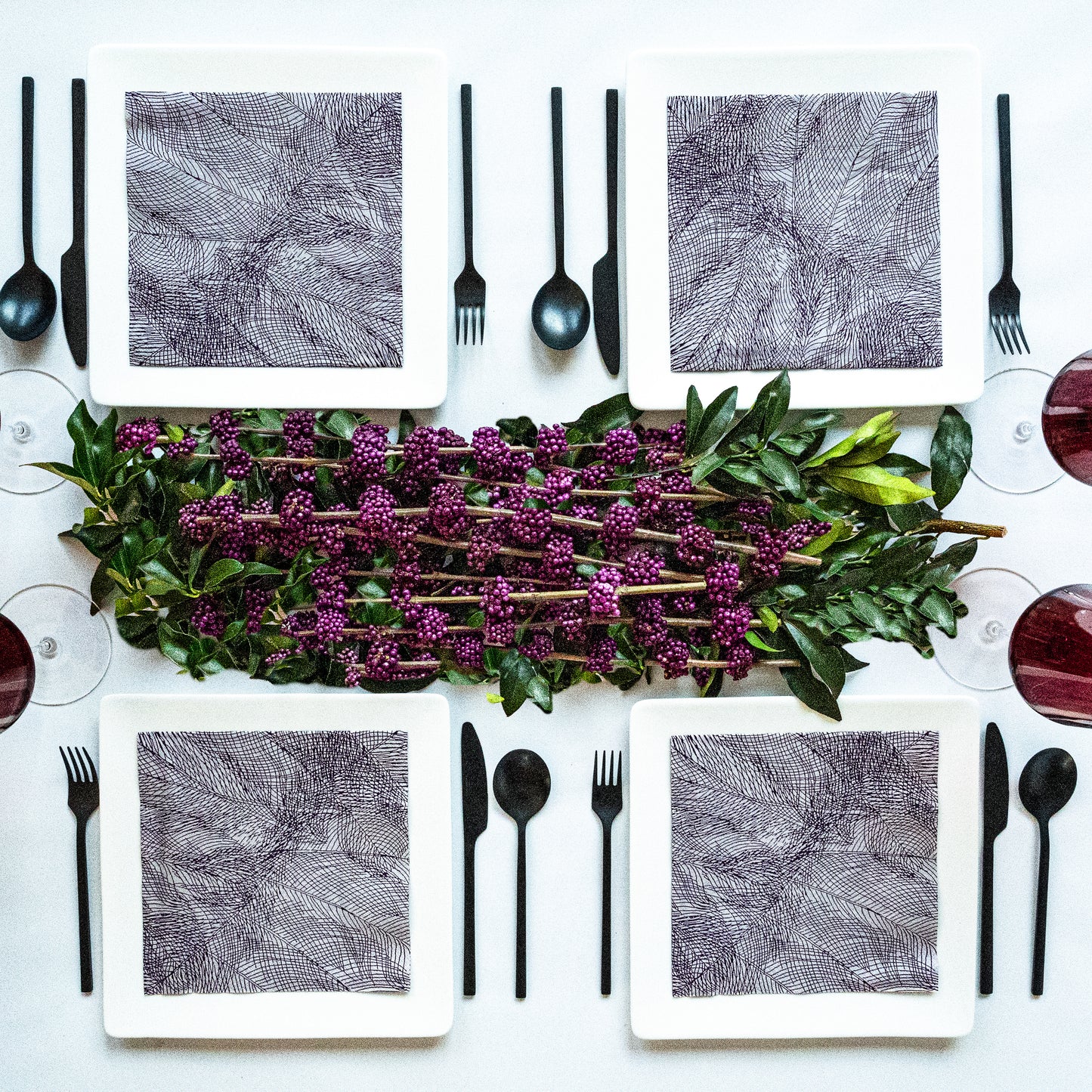 Gray and purple dinner napkin with abstract pattern