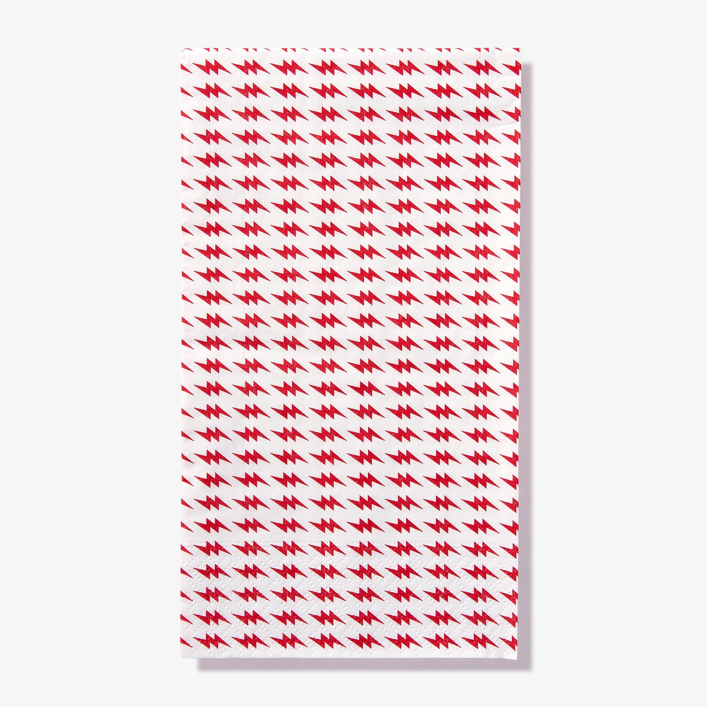White guest towel napkin with red lightning bolt pattern