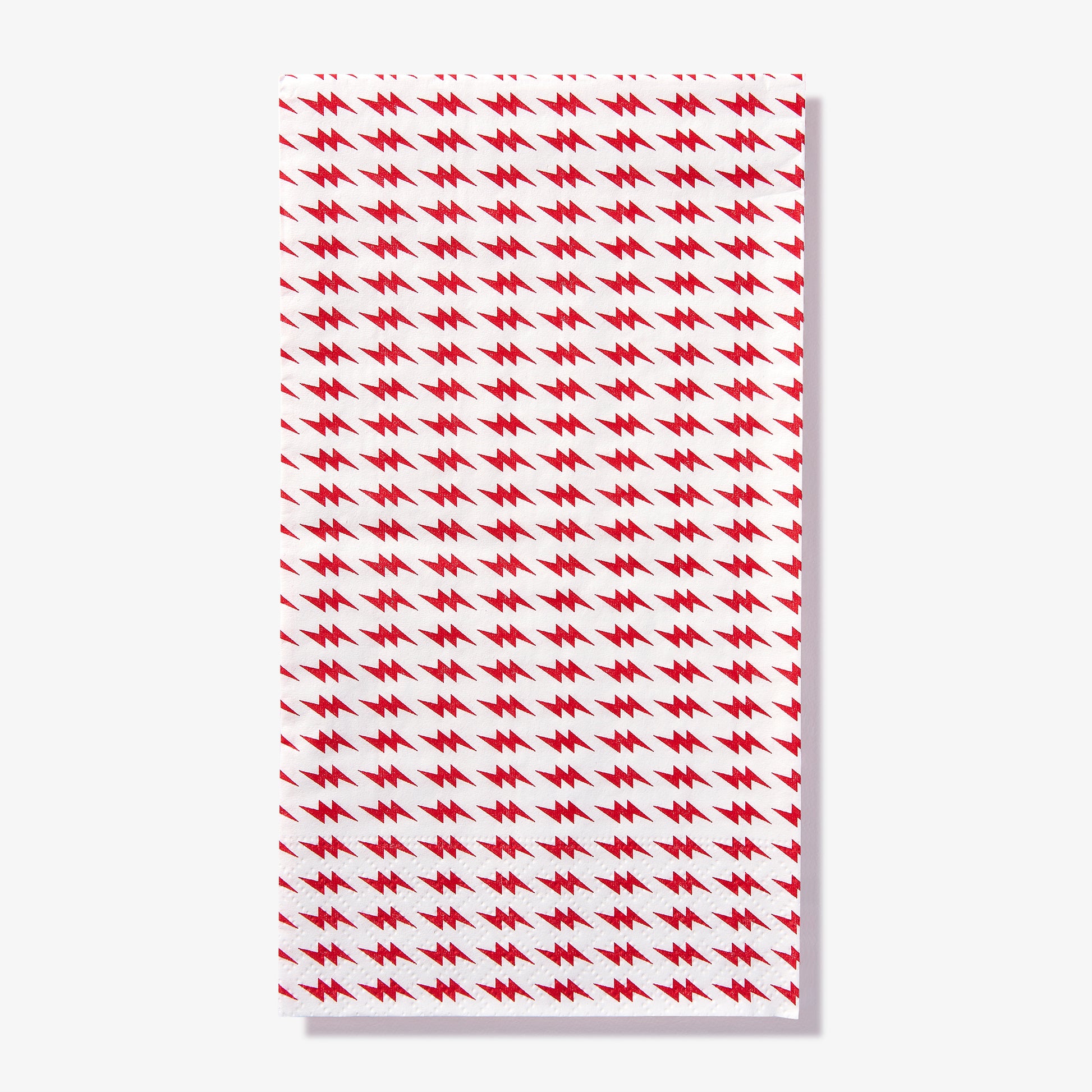 White guest towel napkin with red lightning bolt pattern