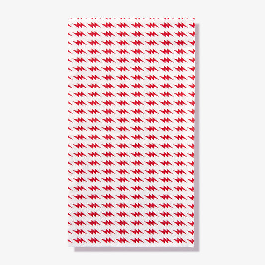 White guest towel napkin with red lightning bolt pattern