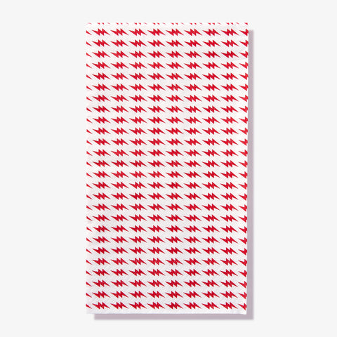 White guest towel napkin with red lightning bolt pattern