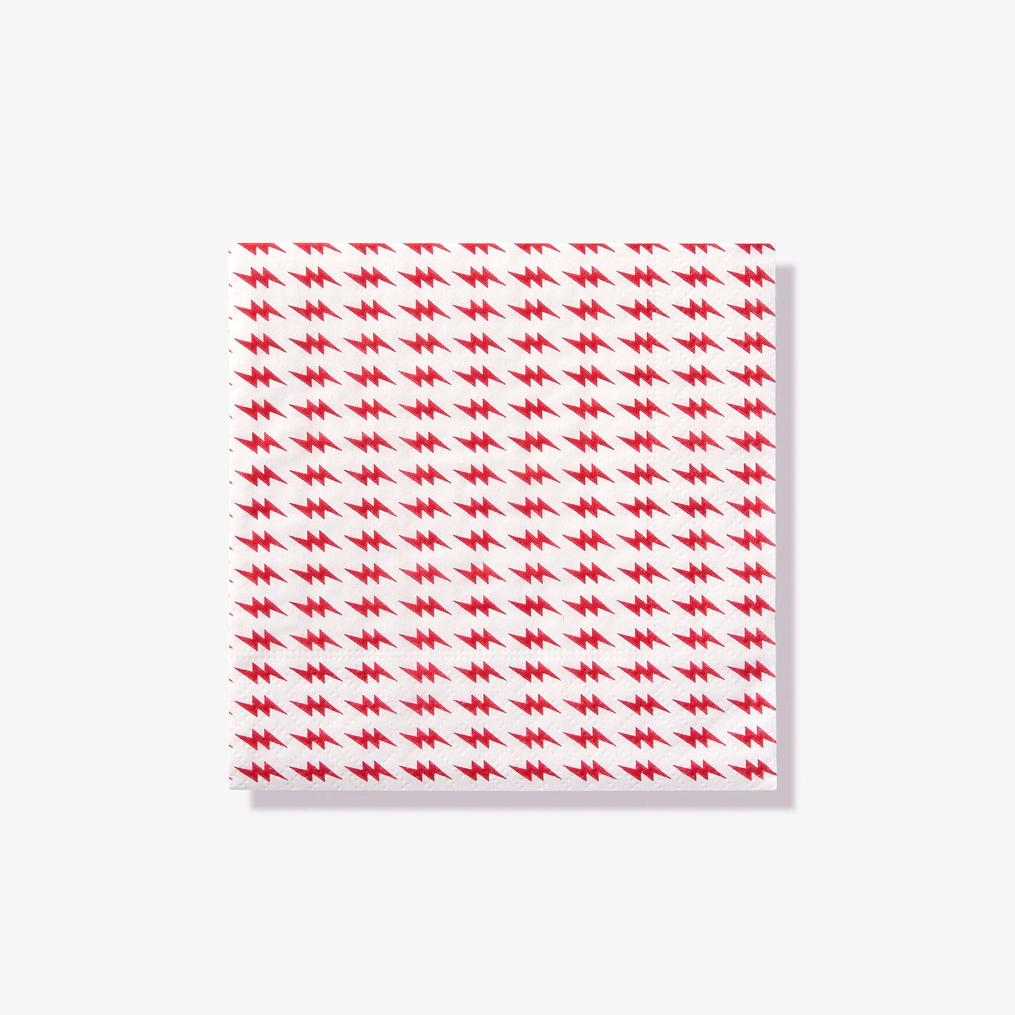 White cocktail napkin with red lightning bolt pattern