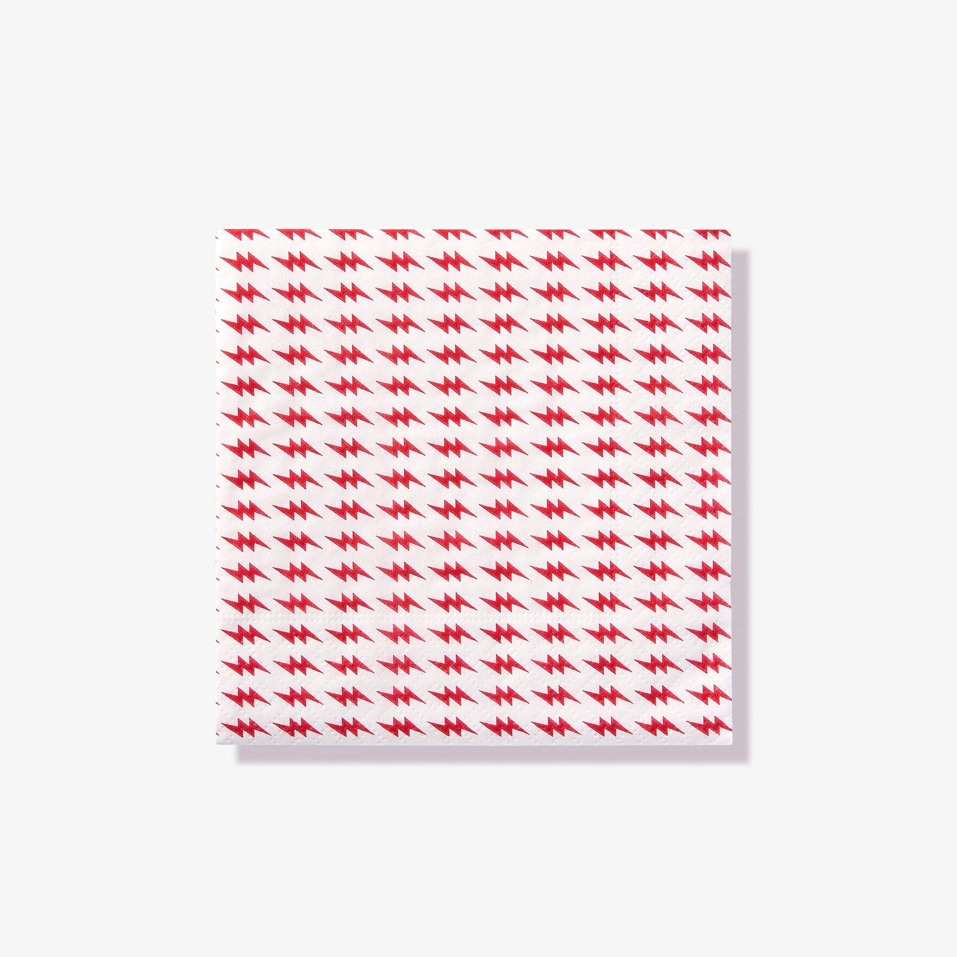 White cocktail napkin with red lightning bolt pattern