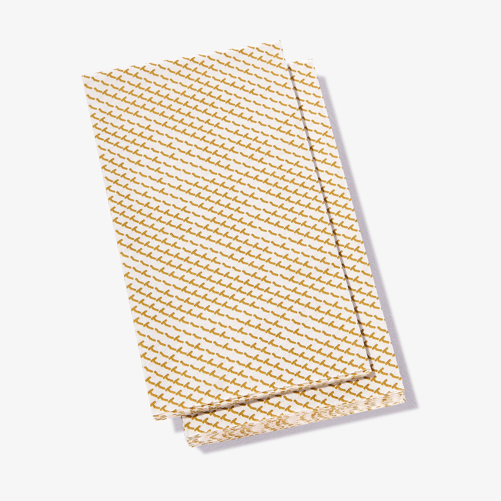 White guest towel napkin with gold abstract pattern