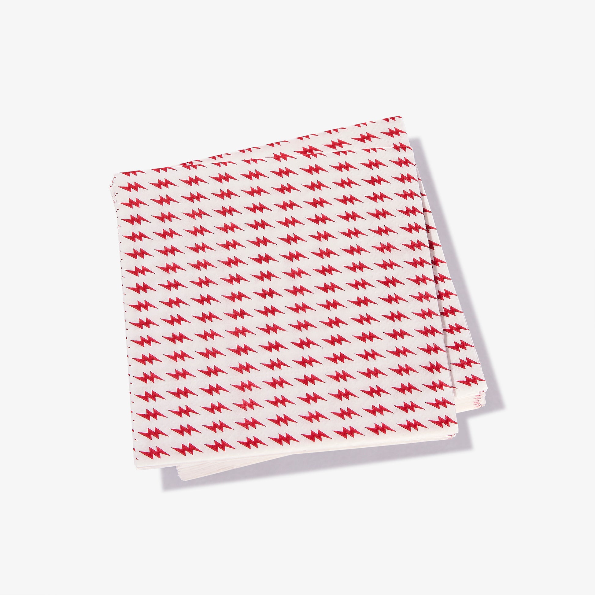 White cocktail napkin with red lightning bolt pattern