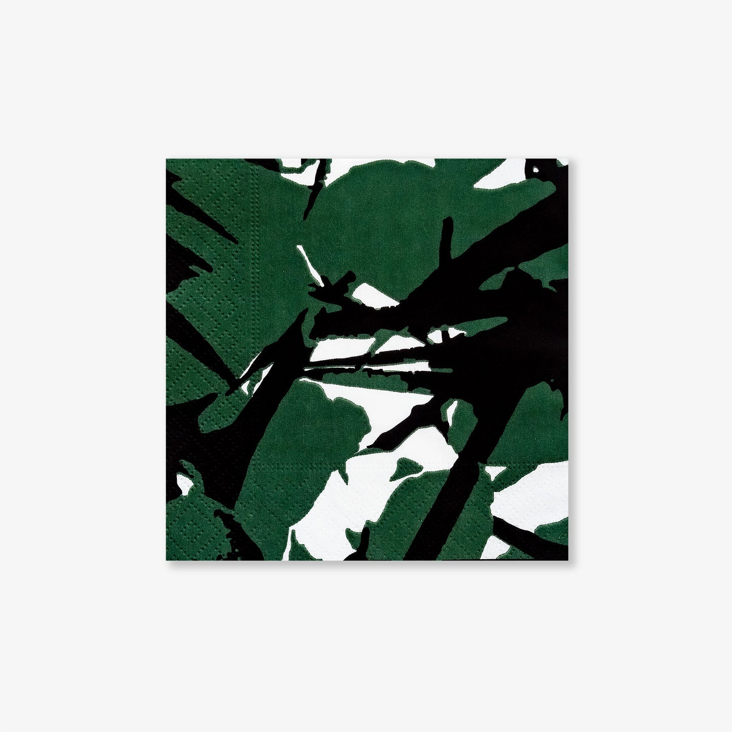 White cocktail napkin with green and black design