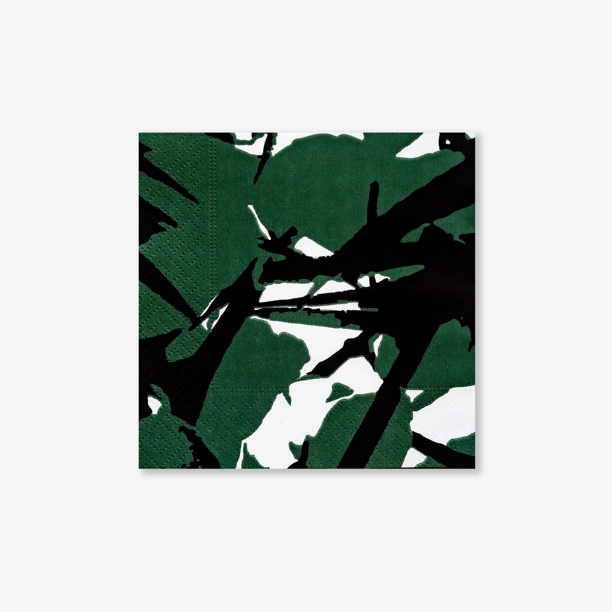 White cocktail napkin with green and black design