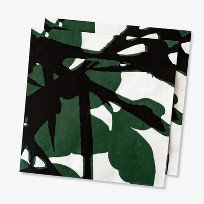 White dinner napkin with green and black design