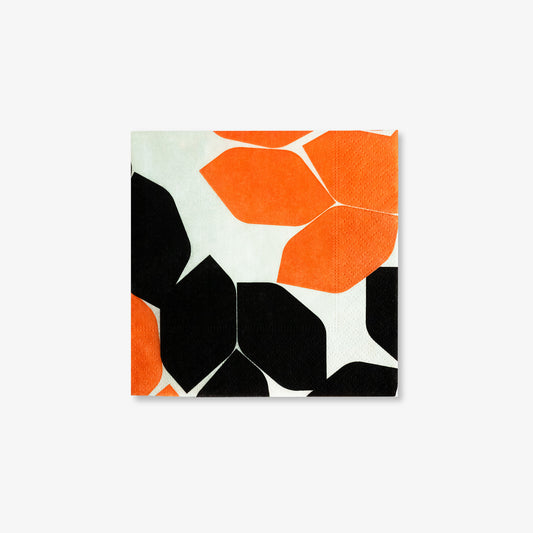 Beige cocktail napkin with orange and black design