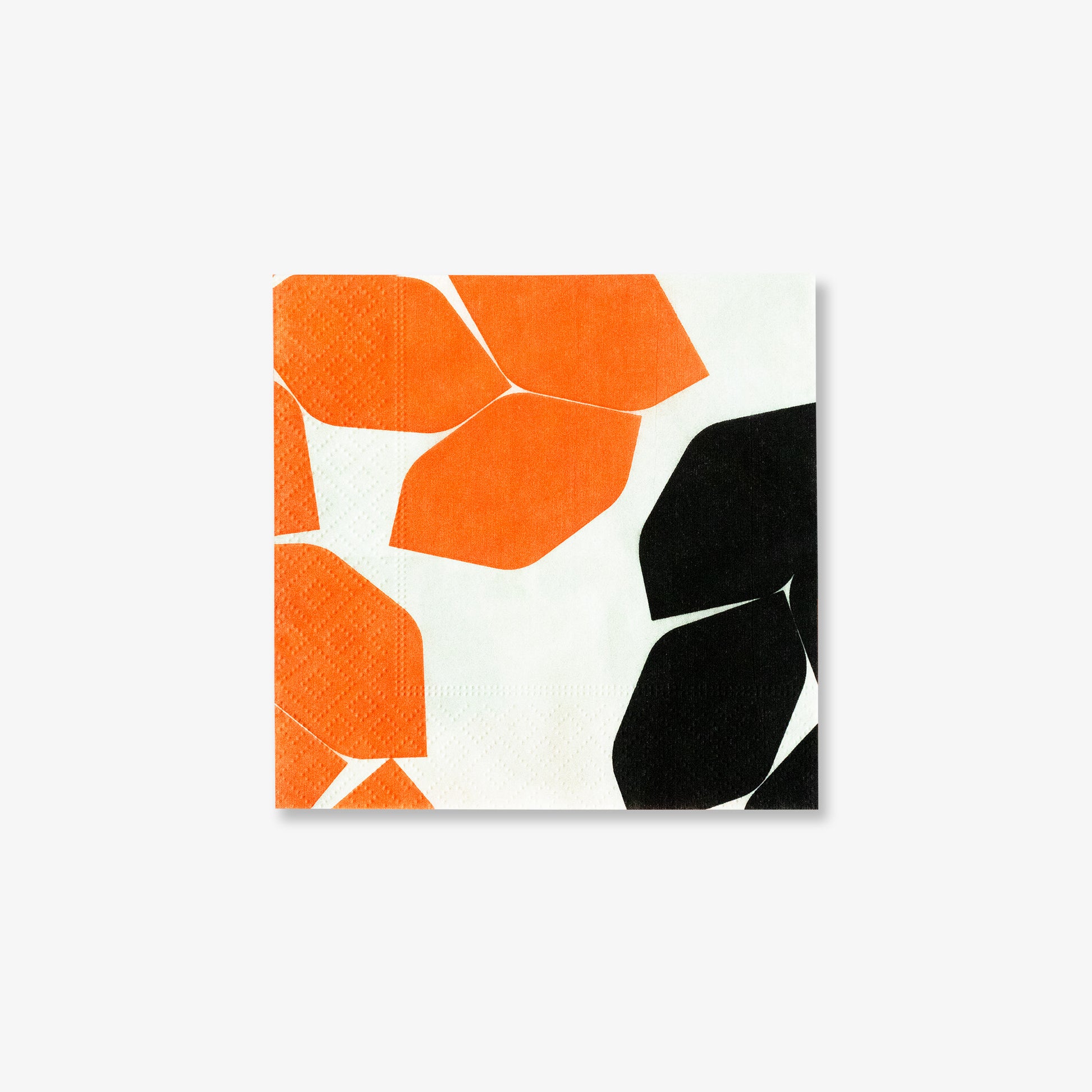 Beige cocktail napkin with orange and black design