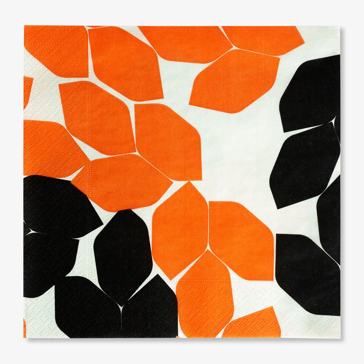 Beige dinner napkin with orange and black design