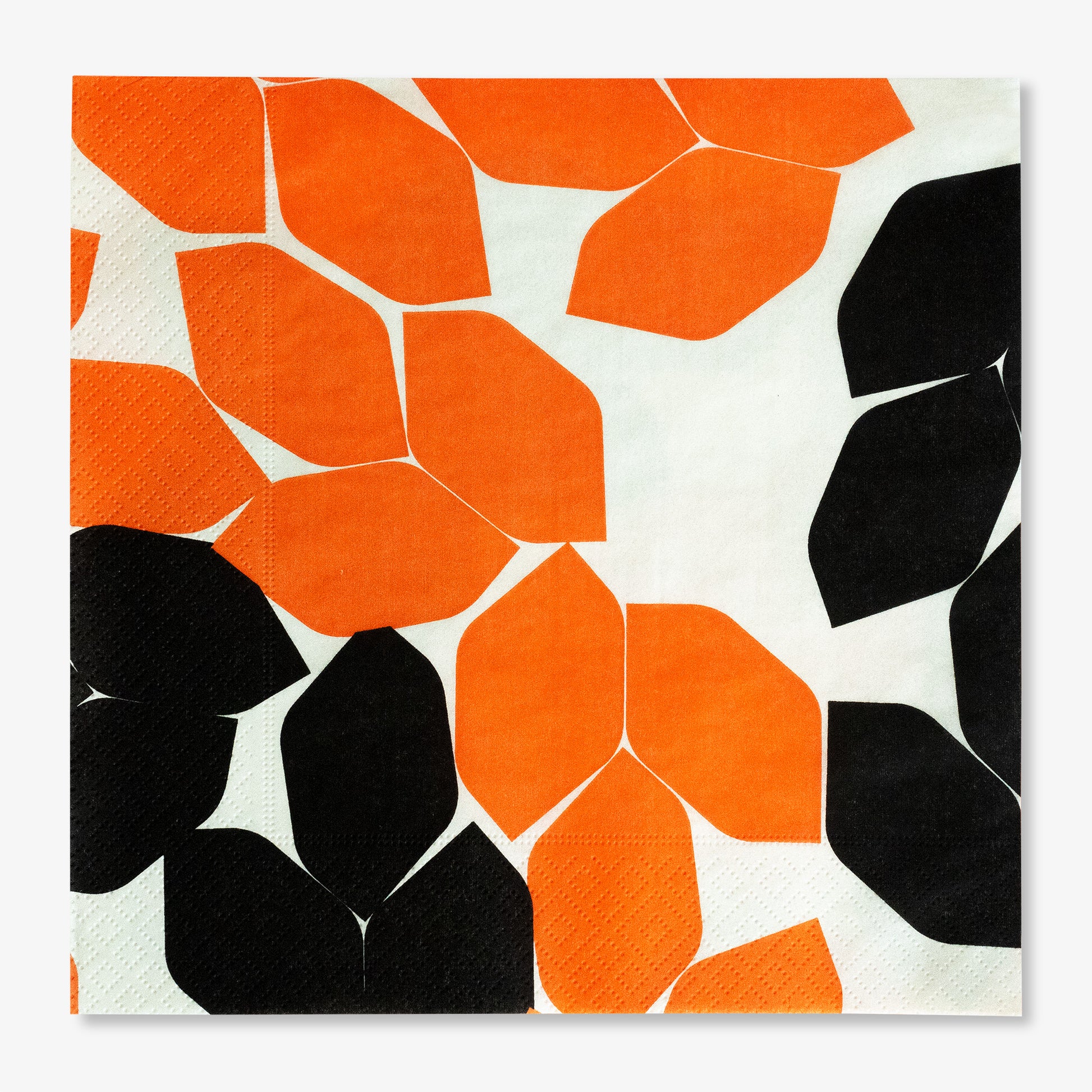 Beige dinner napkin with orange and black design