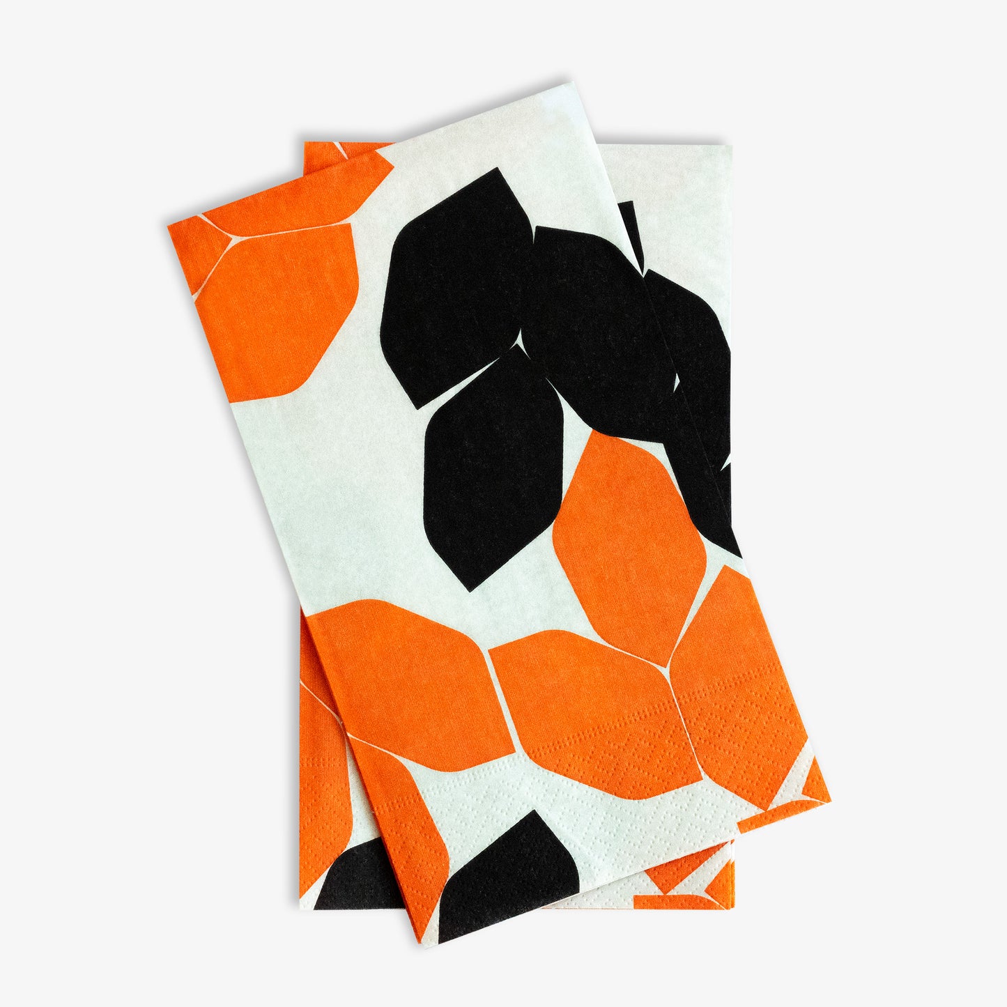 Beige guest towel napkin with orange and black design