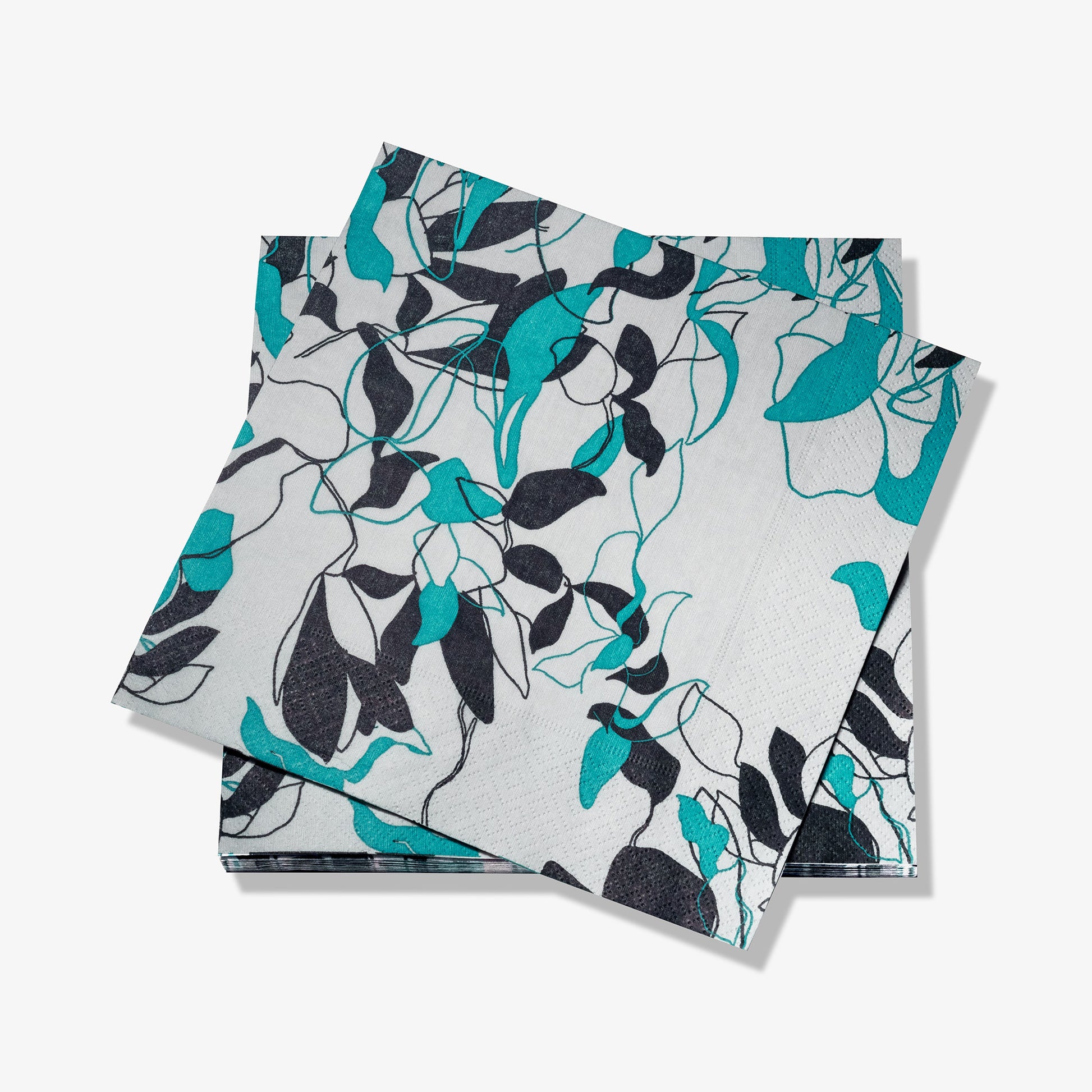 Teal, black and gray dinner napkin with floral/leaf pattern