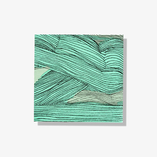 Green, black and off-white cocktail napkin with abstract pattern