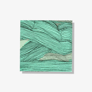 Green, black and off-white cocktail napkin with abstract pattern