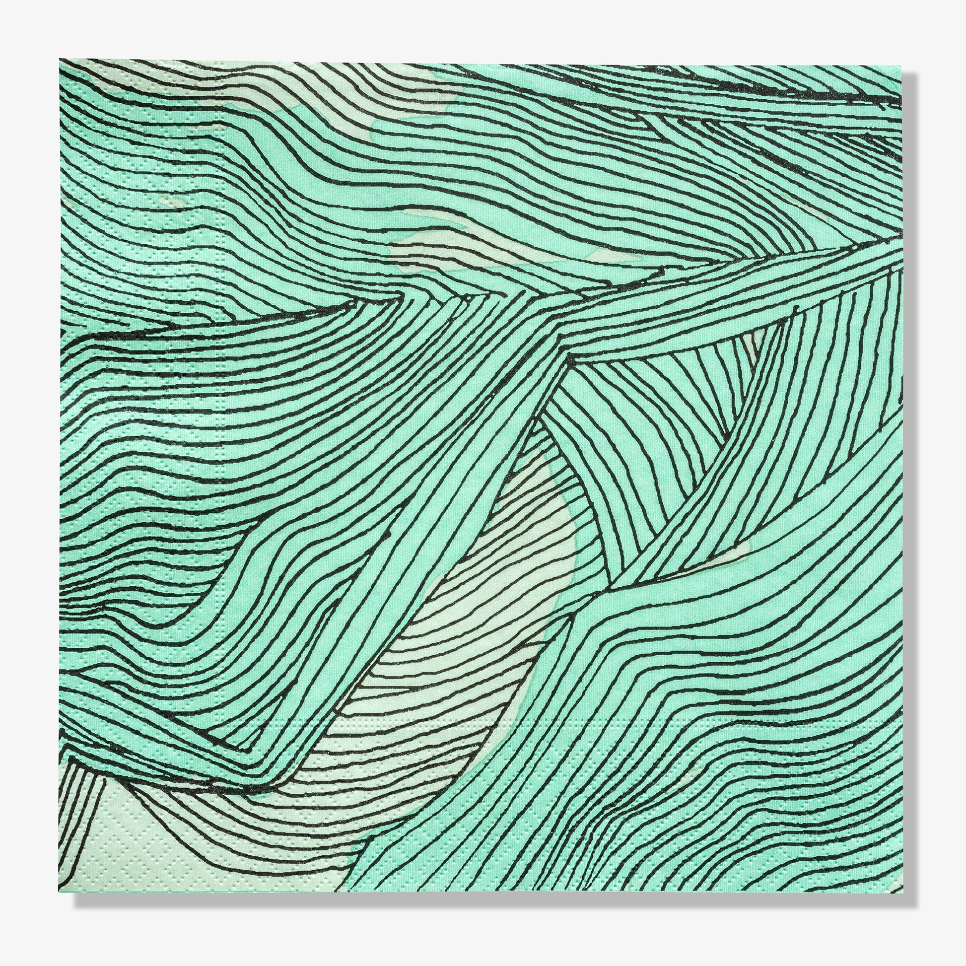 Green, black and off-white dinner napkin with abstract pattern