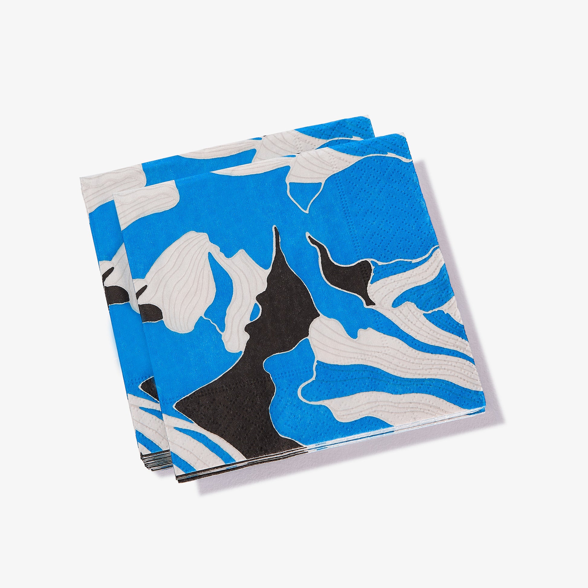 Blue, gray, white and black cocktail napkin with floral pattern