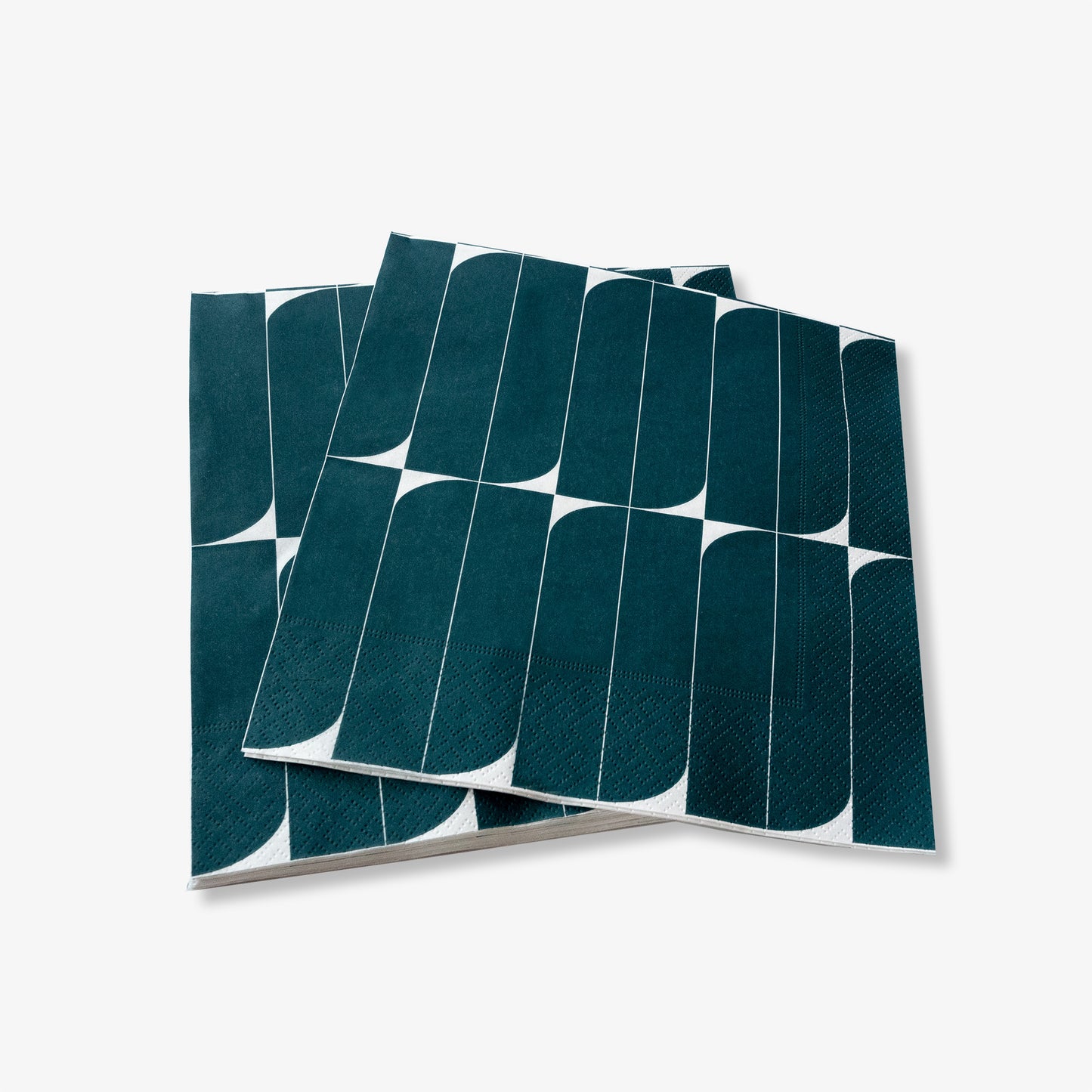 Teal and white dinner napkin with abstract design