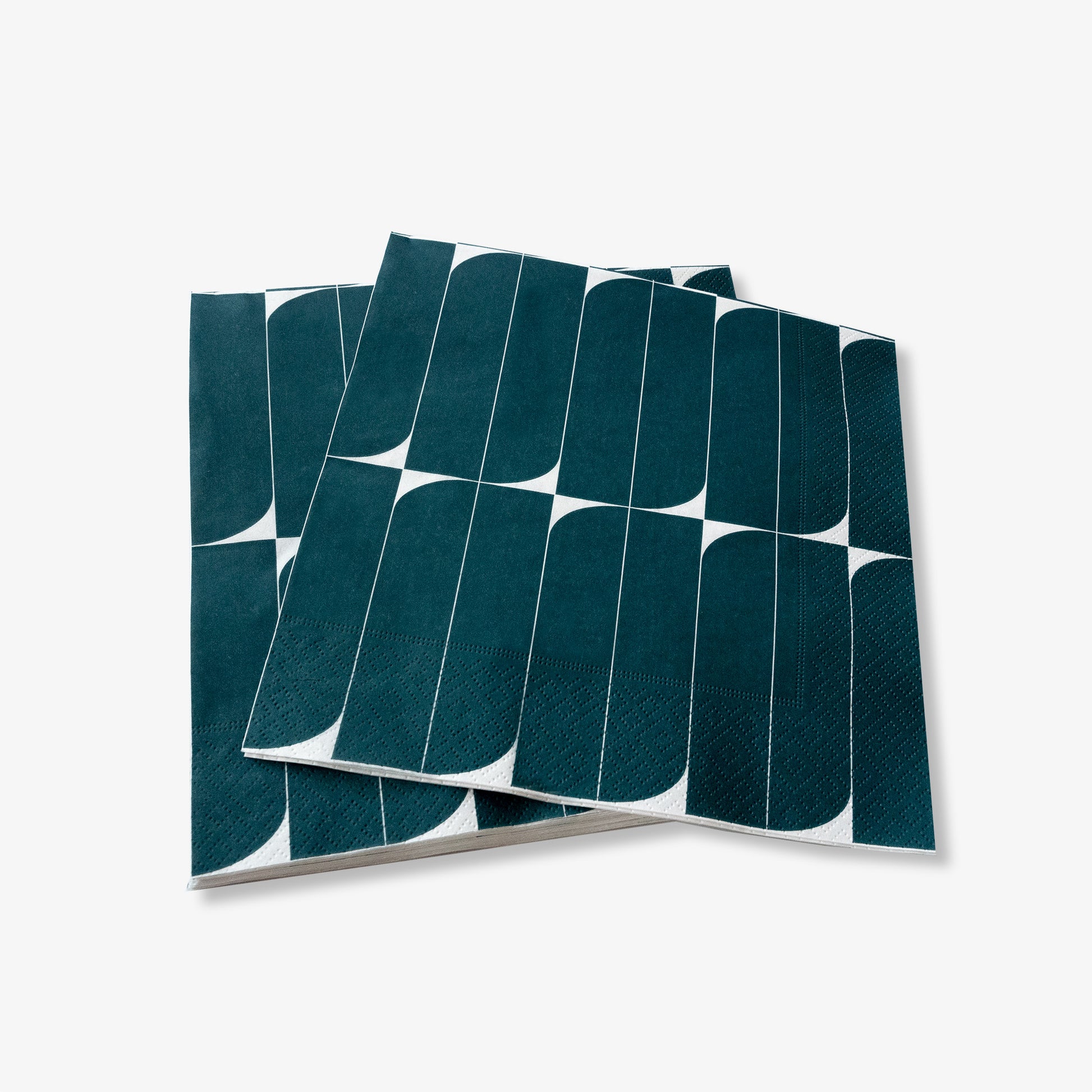 Teal and white dinner napkin with abstract design