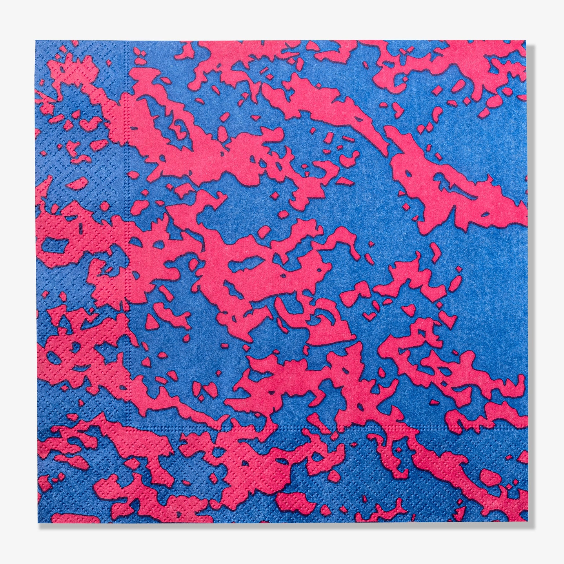 Blue and pink dinner napkin with abstract pattern