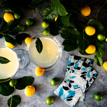 Teal, black and gray guest towel napkin with floral/leaf pattern