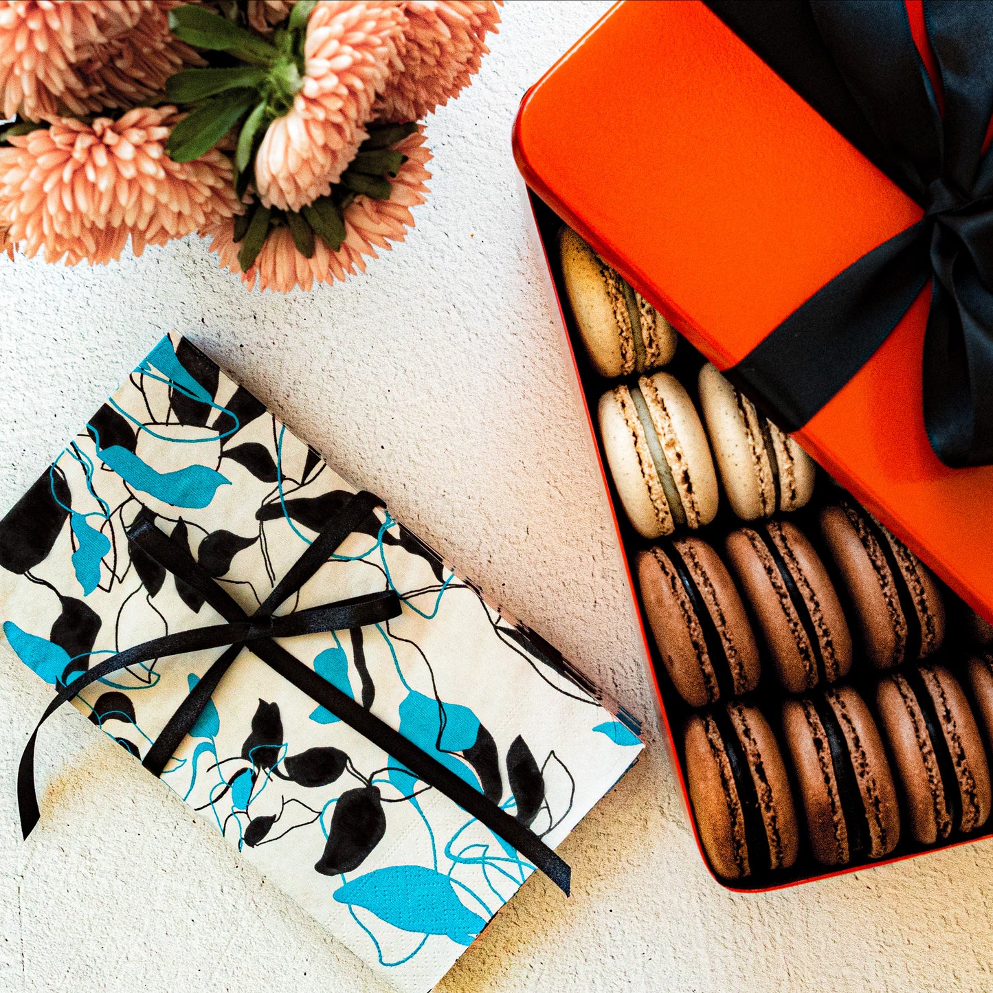 Teal, black and gray guest towel napkin with floral/leaf pattern