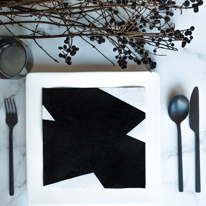 White dinner napkin with black abstract pattern