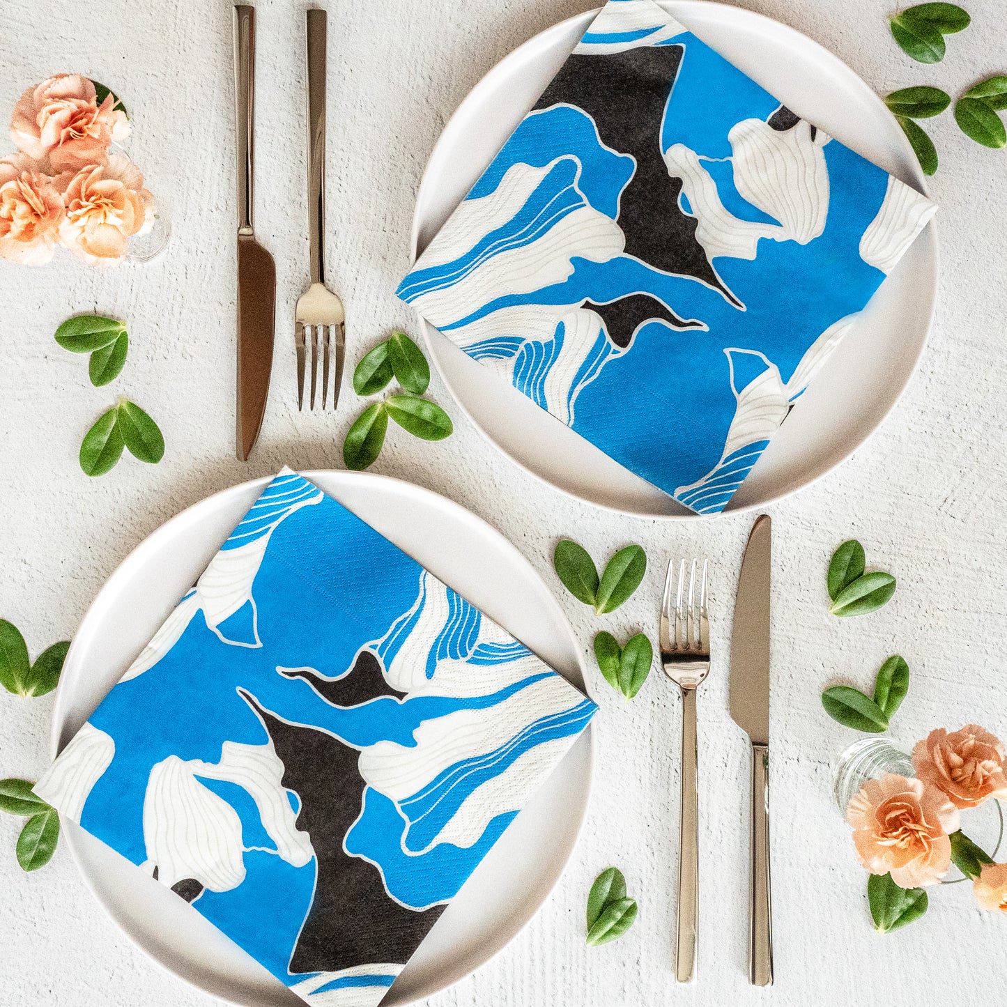 Blue, gray, white and black dinner napkin with floral pattern