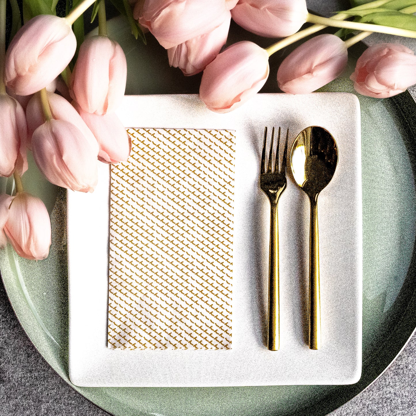 White guest towel napkin with gold abstract pattern