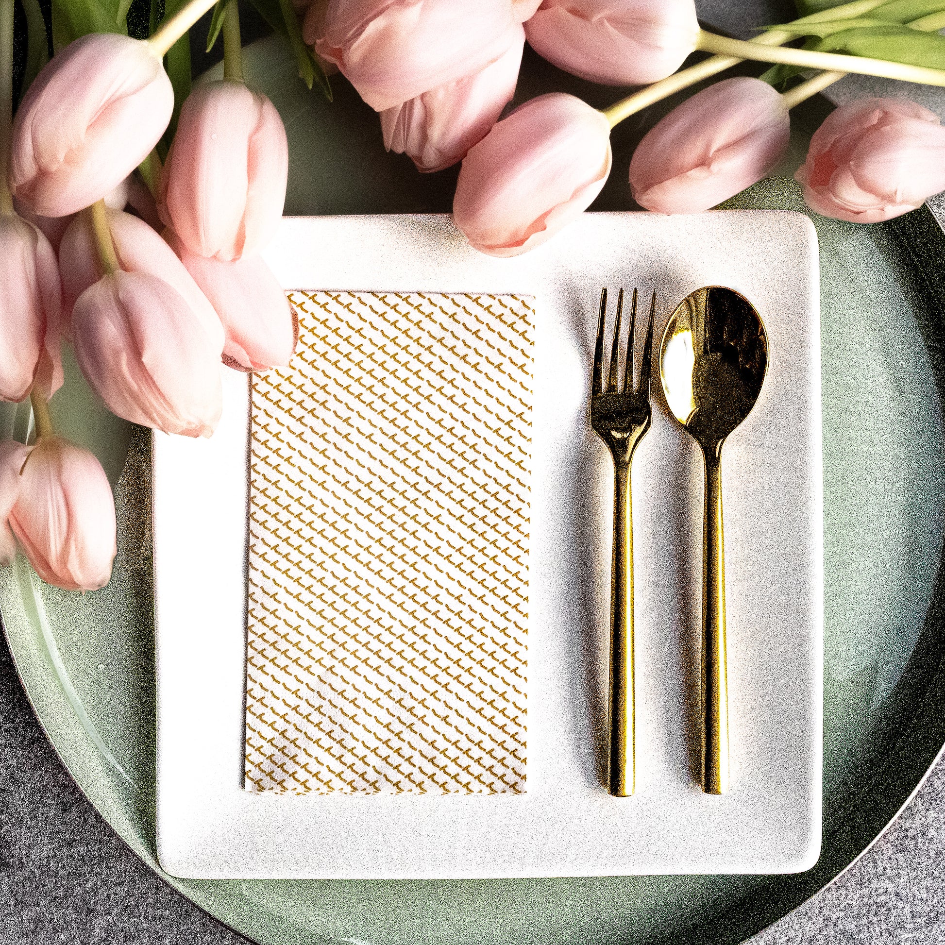White guest towel napkin with gold abstract pattern