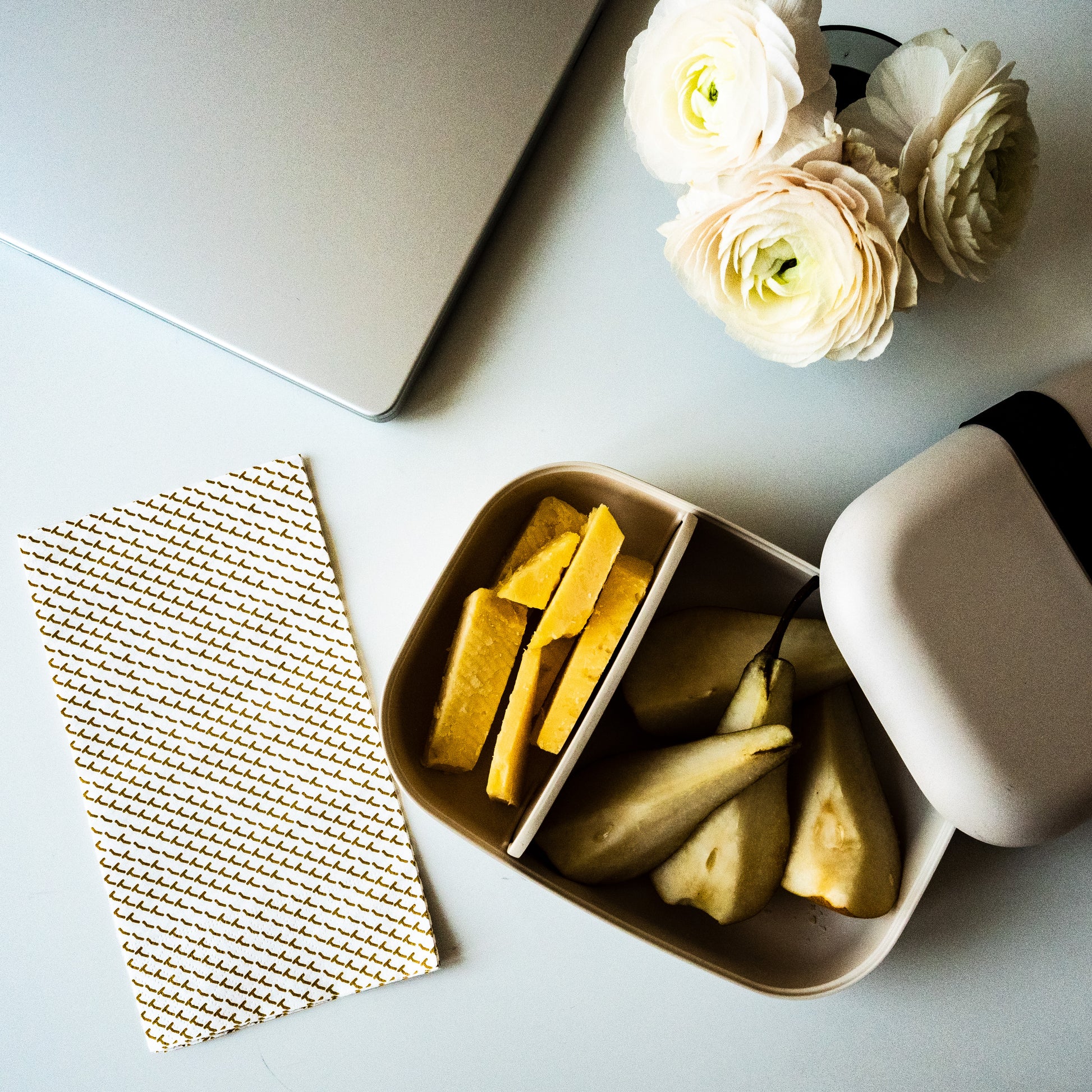 White guest towel napkin with gold abstract pattern