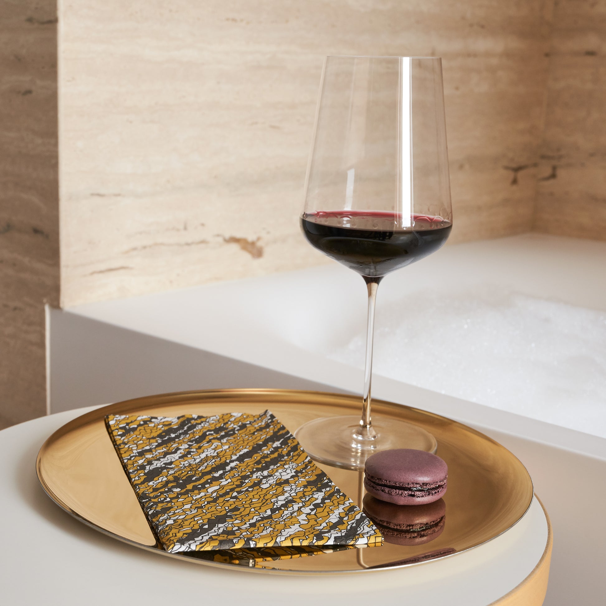 Gold, black and white guest towel napkin with abstract pattern