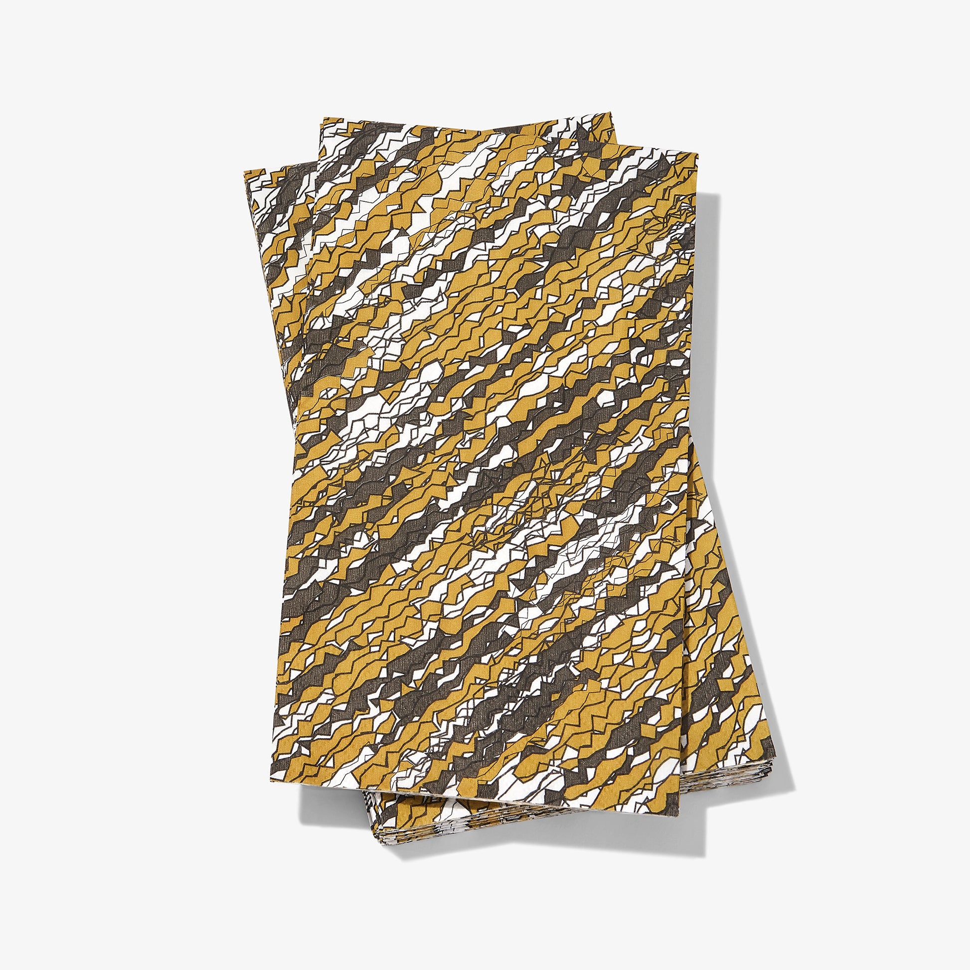 Gold, black and white guest towel napkin with abstract pattern