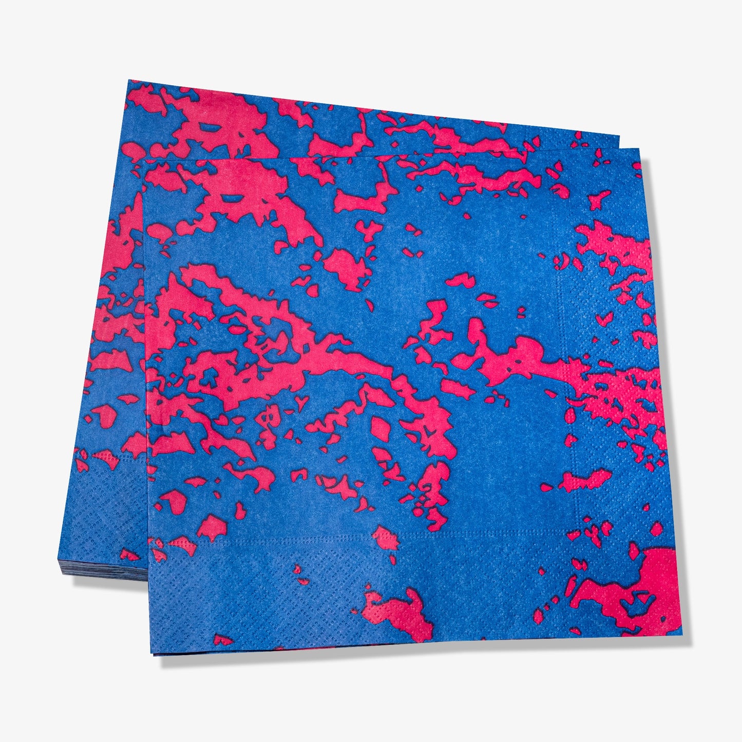 Blue and pink dinner napkin with abstract pattern