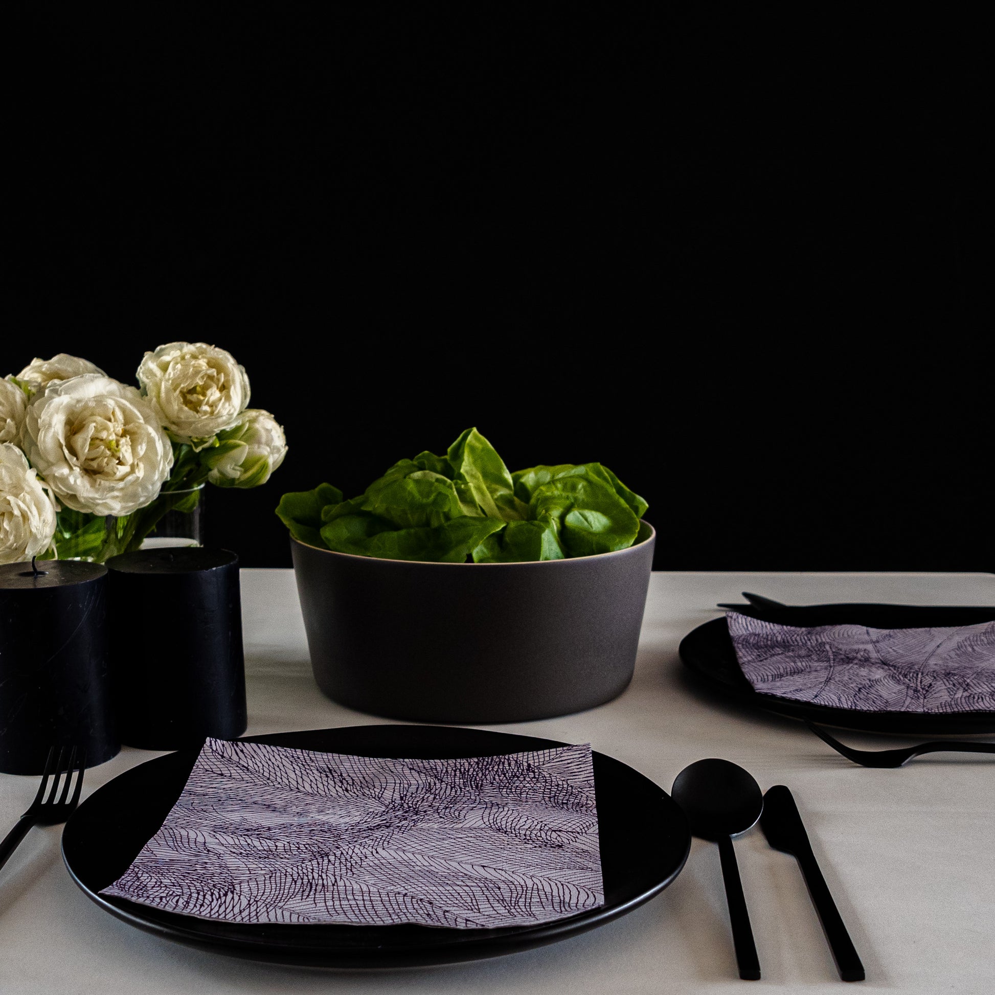 Gray and purple dinner napkin with abstract pattern