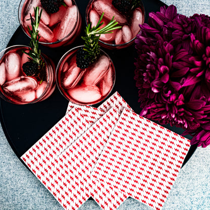 White cocktail napkin with red lightning bolt pattern