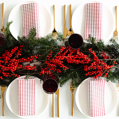 White dinner napkin with red lightning bolt pattern